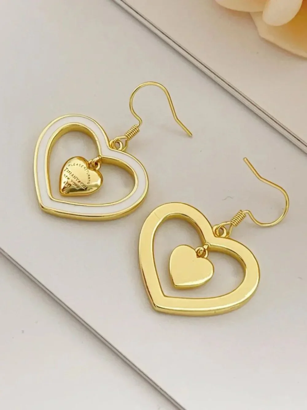 Tiffany & Co. Gold Tassel White Heart Earrings